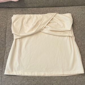 Sleeveless cream blouse